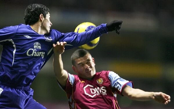 Mikel Arteta. Villa's Wilfred Bouma and Everton's Mikel Arteta