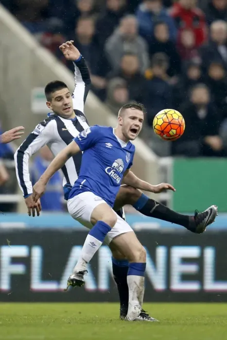 Framed Print : Mitrovic vs. Cleverley: A Battle for Supremacy - Newcastle United vs. Everton, Barclays Premier League, St. James Park Framed Print : Mitrovic vs. Cleverley: A Battle for Supremacy - Newcastle United vs. Everton, Barclays Premier League, St. James Park