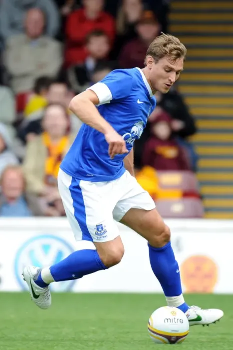 Framed Print : Nikica Jelavic in Action: Everton's Pre-Season Thriller at Motherwell's Fir Park Stadium Framed Print : Nikica Jelavic in Action: Everton's Pre-Season Thriller at Motherwell's Fir Park Stadium