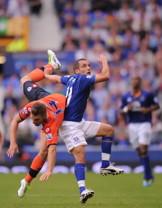 Framed Print : Osman vs. Buzsaky: A Battle at Goodison Park - Everton vs. Queens Park Rangers, Barclays Premier League (2011) Framed Print : Osman vs. Buzsaky: A Battle at Goodison Park - Everton vs. Queens Park Rangers, Barclays Premier League (2011)
