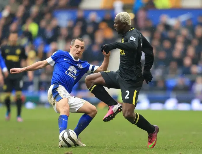 Framed Print : Osman vs. Kone: Wigan Athletic Stuns Everton in FA Cup Quarterfinals at Goodison Park (3-0)