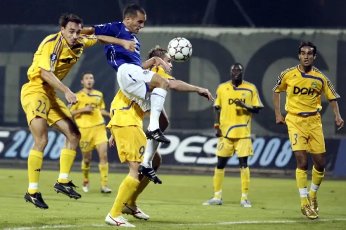 Framed Print : Osman vs Sliusar and Obradovic: Everton's Battle in UEFA Cup against Metalist Kharkiv Framed Print : Osman vs Sliusar and Obradovic: Everton's Battle in UEFA Cup against Metalist Kharkiv