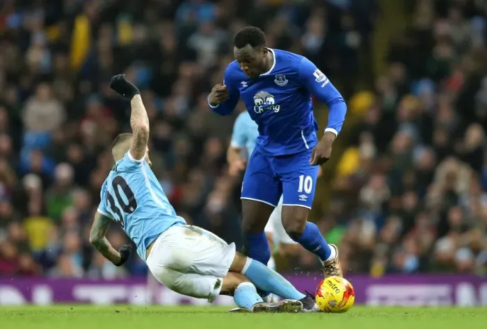 Framed Print : Otamendi vs. Lukaku: A Battle to Reach the Capital One Cup Final at Etihad Stadium