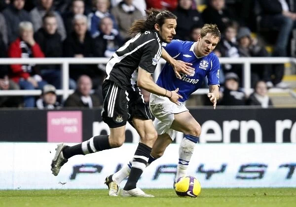 Phil Jagielka vs. Jonas Gutierrez: Everton vs. Newcastle United - Barclays Premier League Clash at St James Park (February 2009)