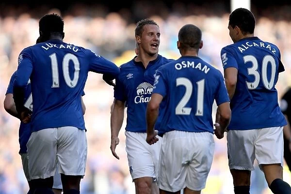 Phil Jagielka's Thrilling Goal: Everton's First Strike Against Aston Villa in Barclays Premier League at Goodison Park