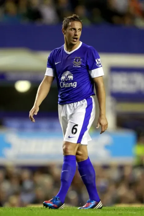 Framed Print : Phil Jagielka's Triumphant Celebration: Everton's 5-0 Capital One Cup Victory over Leyton Orient (2012)