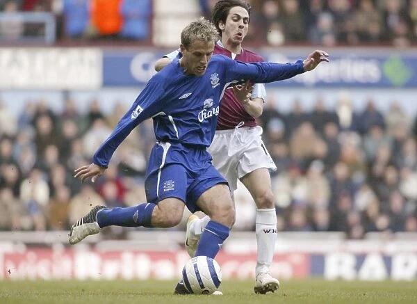 Phil Neville plays the ball forward Mandatory Credit: Action Images  /  Lee Mills Livepic