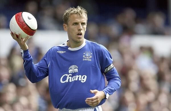Phil Neville takes a throw in Mandatory Credit: Action Images  /  Carl Recine Livepic