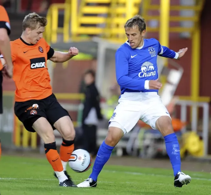 Framed Print : Phil Neville in Action: Everton's Pre-Season Clash with Dundee United at Tannadice Park Framed Print : Phil Neville in Action: Everton's Pre-Season Clash with Dundee United at Tannadice Park