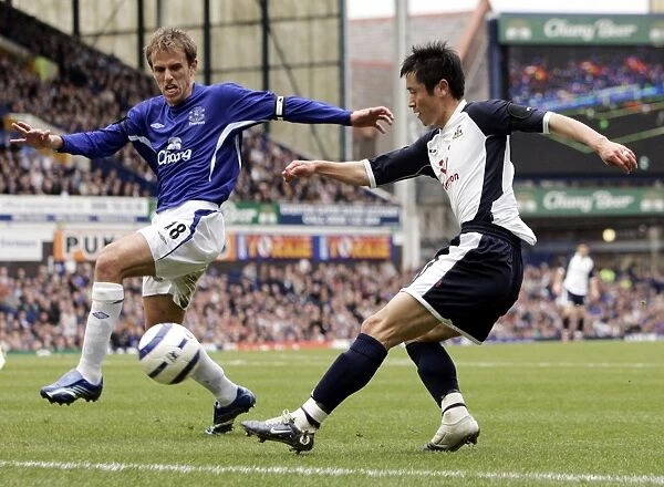 Phil Neville challenges Lee Young-Pyo