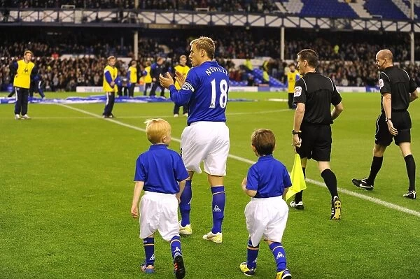 Phil Neville Greets Fans and Leads Mascots: Everton vs. Chelsea, Carling Cup Round 4 at Goodison Park (October 26, 2011)