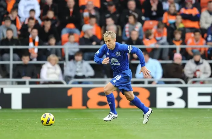 Framed Print : Phil Neville Leads Everton in Barclays Premier League Battle at Bloomfield Road Against Blackpool Framed Print : Phil Neville Leads Everton in Barclays Premier League Battle at Bloomfield Road Against Blackpool
