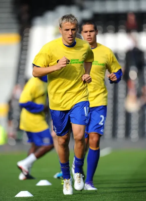 Framed Print : Phil Neville Leads Everton at Craven Cottage: Barclays Premier League Match against Fulham (23 October 2011)