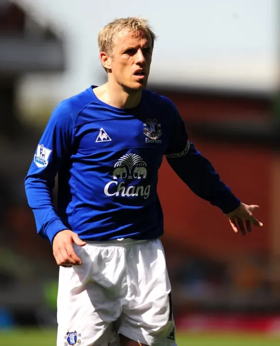 Framed Print : Phil Neville Leads Everton's Charge Against Wolverhampton Wanderers in the Barclays Premier League (09 April 2011) Framed Print : Phil Neville Leads Everton's Charge Against Wolverhampton Wanderers in the Barclays Premier League (09 April 2011)