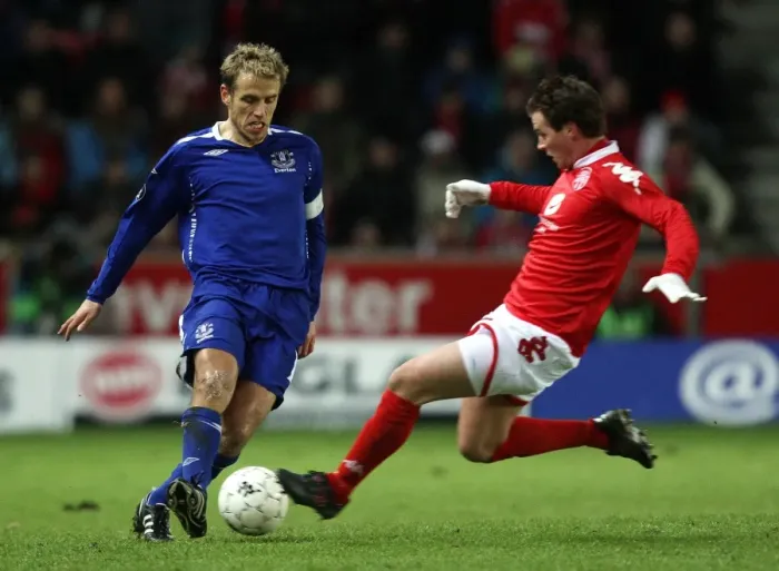 Framed Print : Phil Neville vs. Petter Vaagan Moen: Everton vs. SK Brann in UEFA Cup Third Round First Leg Framed Print : Phil Neville vs. Petter Vaagan Moen: Everton vs. SK Brann in UEFA Cup Third Round First Leg