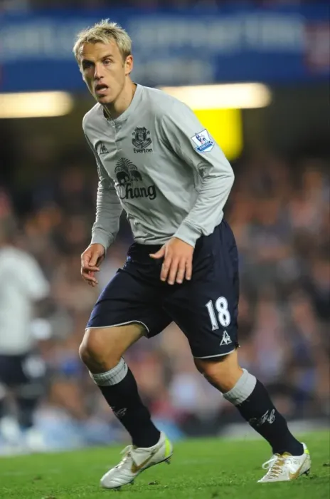 Framed Print : Phil Neville's Battle at Stamford Bridge: Everton Star Clashes with Chelsea in the Premier League (15 October 2011)