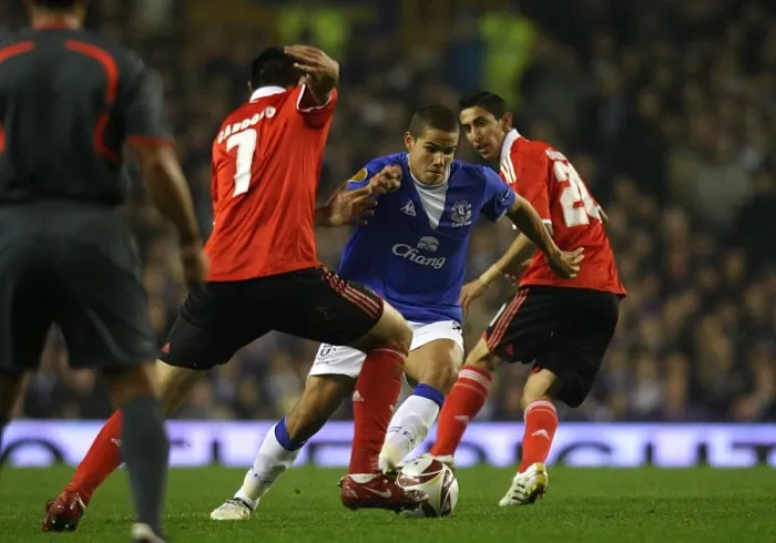 Framed Print : Rodwell's Intense Battle: Everton's Jack Battles Cardozo and Di Maria in UEFA Europa League Clash