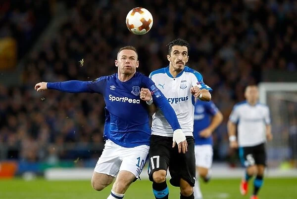 Rooney vs. Cunha: Battle for the Ball in UEFA Europa League Group E - Everton vs. Apollon Limassol at Goodison Park