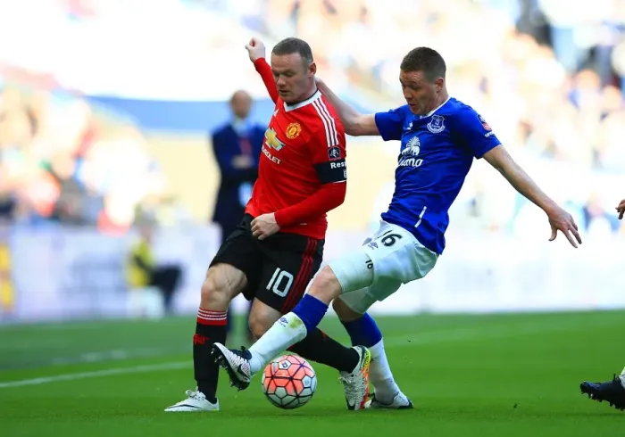 Framed Print : Rooney vs McCarthy: An Intense Battle - Everton vs Manchester United FA Cup Semi-Final at Wembley Stadium Framed Print : Rooney vs McCarthy: An Intense Battle - Everton vs Manchester United FA Cup Semi-Final at Wembley Stadium