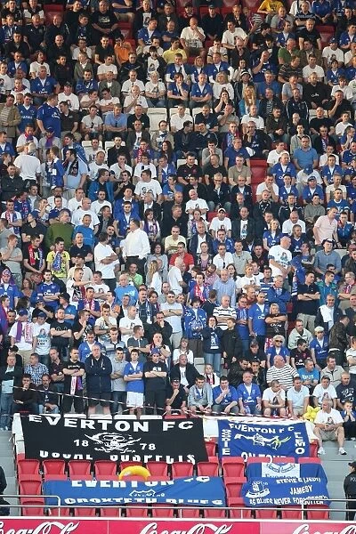 Sea of Blue: Everton Fans Unite at Estadio da Luz