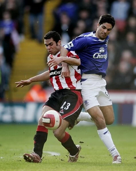 Sheffield United v Everton - Mikel Arteta in action against Ahmed Fathi