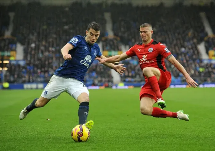 Framed Print : Sliding Showdown: Coleman vs. Konchesky at Goodison Park Framed Print : Sliding Showdown: Coleman vs. Konchesky at Goodison Park