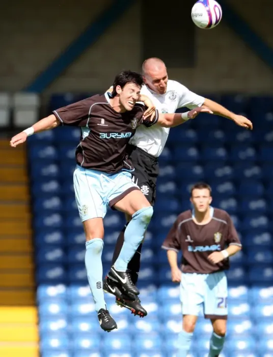 Framed Print : Stubbs vs Broughton: A Heading Showdown in the 2007 Everton-Bury Pre-Season Friendly