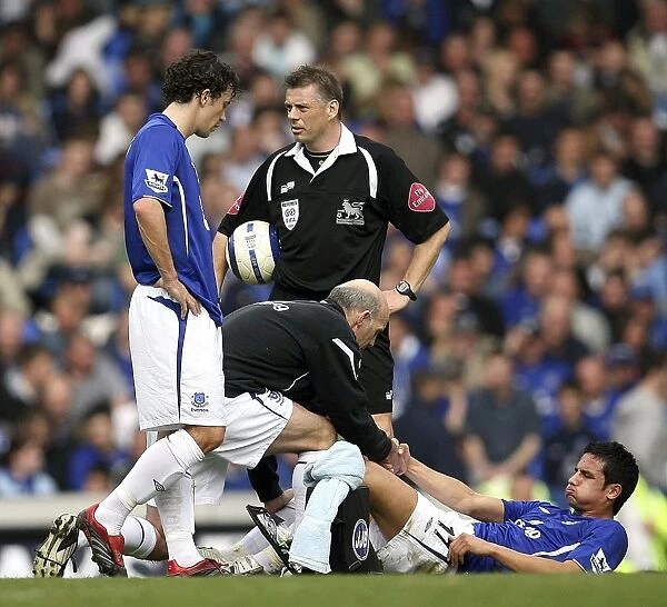Tim Cahill is down with an injury Mandatory Credit: Action Images  /  Carl Recine Livepic
