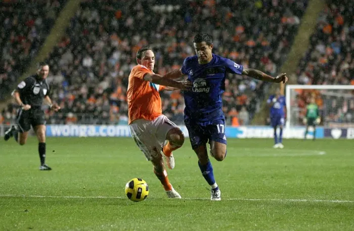 Framed Print : Tim Cahill vs. David Vaughan: A Battle at Everton vs. Blackpool, Premier League Framed Print : Tim Cahill vs. David Vaughan: A Battle at Everton vs. Blackpool, Premier League