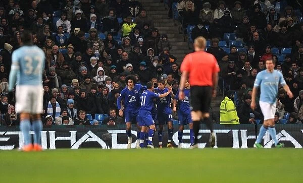 Tim Cahill's Thrilling Opener: Everton Players Celebrate Against Manchester City (December 2010)
