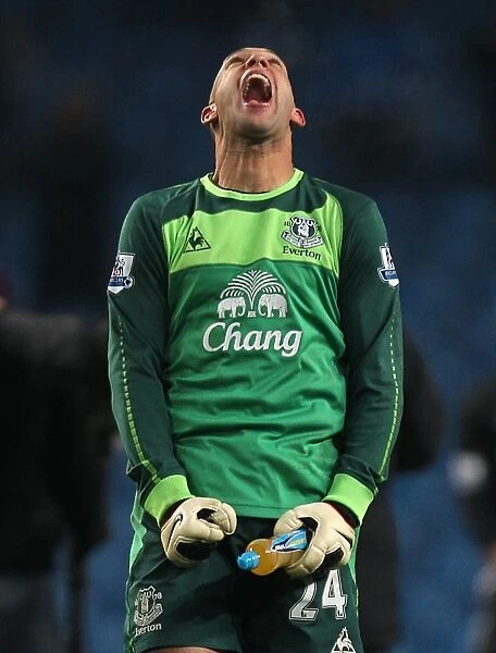 Tim Howard's Triumph: Everton's Goalkeeper Rejoices in Manchester City Victory (2010 Barclays Premier League)