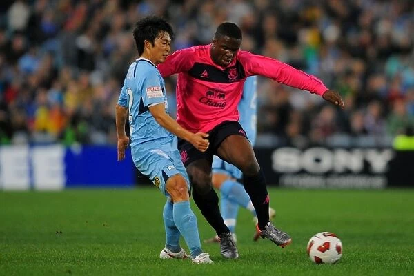 Victor Anichebe. Sydney FC's Byun Sung-Hwan and Everton's Victor Anichebe