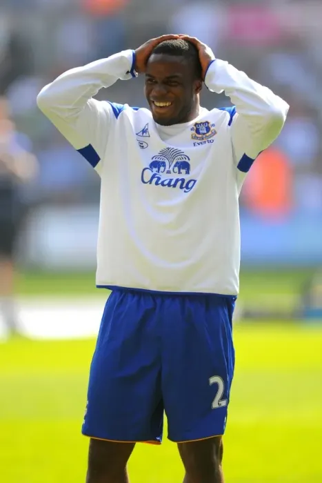 Framed Print : Victor Anichebe's Smile in Everton's Warm-Up Before Swansea City Clash (24 March 2012)