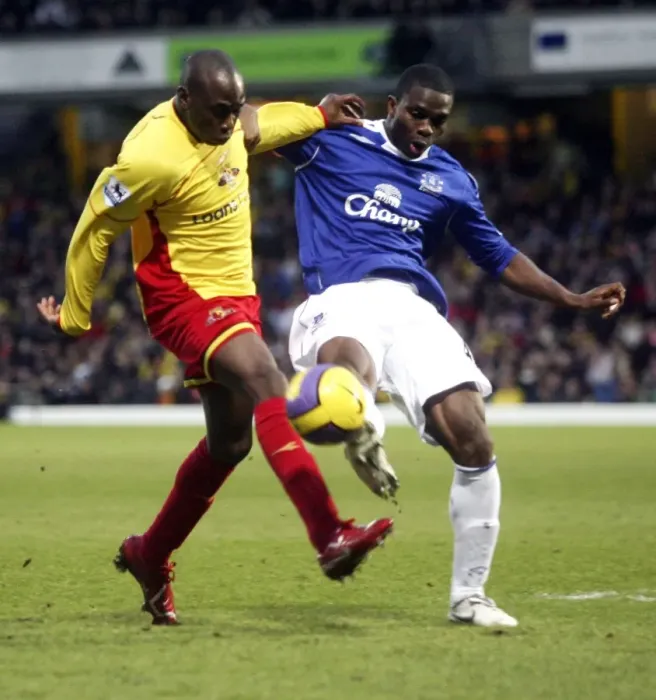Framed Print : Watford v Everton Steve Kabba of Watford in action with Evertons Joseph Yobo