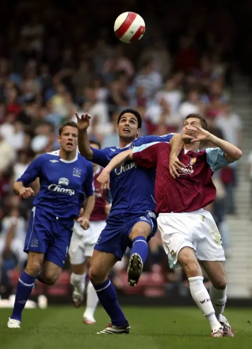 Framed Print : West Ham United v Everton George McCartney and Mikel Arteta
