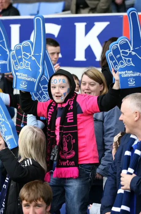 Framed Print : Young Everton Fan's Thrill: Half-Time Excitement at Goodison Park with Giant Foam Hands (Everton vs Stoke City, Barclays Premier League, 2010)