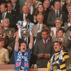 1995 FA Cup Final: Everton's Dave Watson Lifts the Trophy after 1-0 Win over Manchester United
