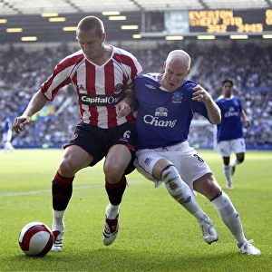 21 / 10 / 06 Phil Jagielka - Sheffield United in action against Andrew Johnson