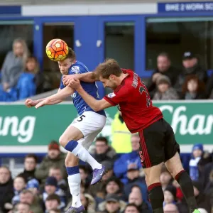 Aerial Clash: Cleverley vs. Dawson at Goodison Park - Everton vs. West Bromwich Albion Aerial Clash: Cleverley vs. Dawson at Goodison Park - Everton vs. West Bromwich Albion