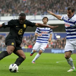 Anichebe vs. Nelsen: A Tight Battle for the Goal - Everton vs. Queens Park Rangers, Premier League Anichebe vs. Nelsen: A Tight Battle for the Goal - Everton vs. Queens Park Rangers, Premier League
