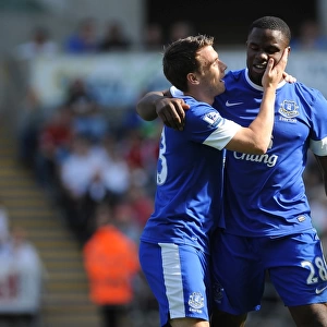 Anichebe's Triumph: Everton's Victor Anichebe Celebrates Goal with Seamus Coleman in 3-0 Victory over Swansea City (September 22, 2012)