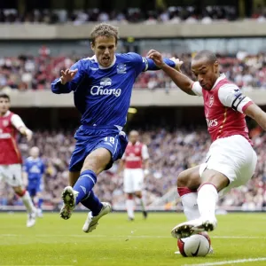 Arsenal v Everton 28 / 10 / 06 Arsenals Thierry Henry and Evertons Phil Neville in action