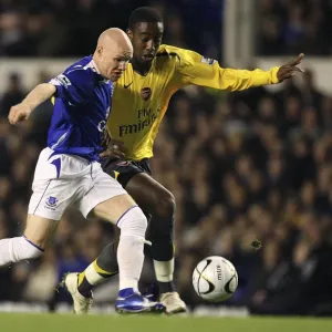 Arsenal's Johan Djourou Challenges Everton's Andy Johnson for the Ball Print Arsenal's Johan Djourou Challenges Everton's Andy Johnson for the Ball Print