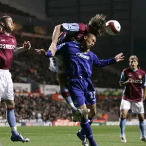 Aston Villa v Everton James Vaughan in action against Olof Mellberg Aston Villa v Everton James Vaughan in action against Olof Mellberg