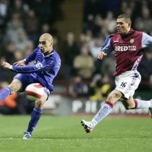 Aston Villa v Everton James Vaughan in action against Wilfred Bouma Aston Villa v Everton James Vaughan in action against Wilfred Bouma