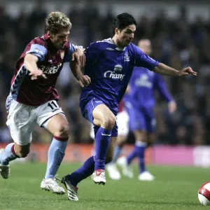 Aston Villa v Everton Stilian Petrov in action against Mikel Arteta Aston Villa v Everton Stilian Petrov in action against Mikel Arteta