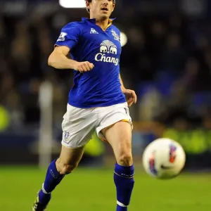 Barclays Premier League Showdown: Everton vs Arsenal at Goodison Park - Leighton Baines in Action Barclays Premier League Showdown: Everton vs Arsenal at Goodison Park - Leighton Baines in Action