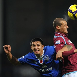 Battle for the Ball: Diamanti vs. Cahill - Premier League Clash between West Ham and Everton