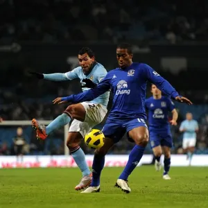 Battle for the Ball: Distin vs Tevez - A Premier League Rivalry (Manchester City vs Everton, 20 December 2010) Battle for the Ball: Distin vs Tevez - A Premier League Rivalry (Manchester City vs Everton, 20 December 2010)