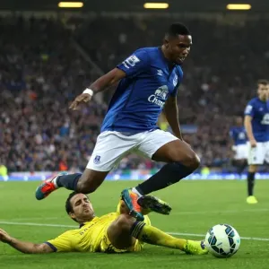 Print of Fabregas and Eto'o in Mid-Air Tussle Print of Fabregas and Eto'o in Mid-Air Tussle